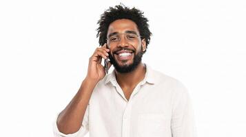 A man with a beard and glasses is talking on his phone photo