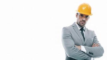 A man in a suit and hard hat photo