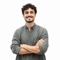 A man in a green shirt is smiling photo
