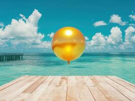 Golden ball floating over serene ocean with wooden pier photo