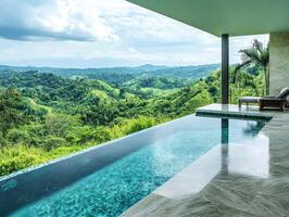 Infinity pool with mountain view in daylight photo
