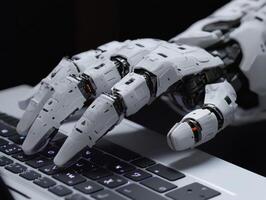Advanced robotic hand typing on a modern keyboard photo