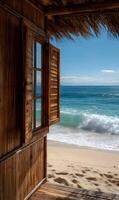 Coastal bliss a hut's window frames the ocean beach and sky creating a tranquil scene photo