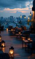 Rooftop lounge with city view and lantern light creates a warm and inviting atmosphere perfect for relaxation photo
