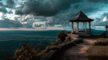 Hilltop haven gazebo overlooks scenic landscape under dramatic cloudy sky photo