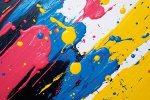 Colorful splashes creating dynamic abstract painting on canvas photo