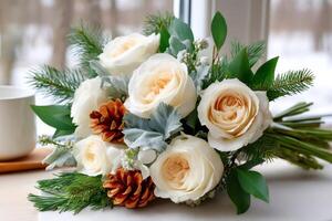 Bouquet of white and peach roses, pine cones and fir branches creating a festive and romantic atmosphere photo