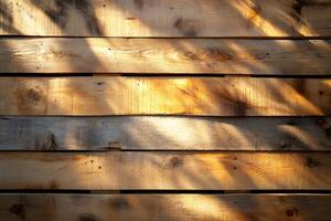 Sunlight creating shadows on wooden planks surface photo