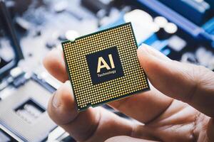 AI chip processor prototype, A hand holds a microchip labeled AI Technology suggesting artificial intelligence processing, machine learning. photo