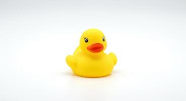 Front View of Yellow Rubber Duck Toy on White Background photo