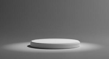 Isolated white round podium on a gray background with a spotlight effect photo