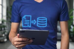 Data Transfer Concept with Tablet and Visual Elements in Office Setting photo