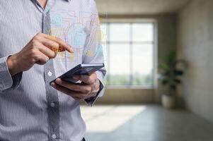 Man Using Smartphone with Digital Interface in Modern Home Space photo