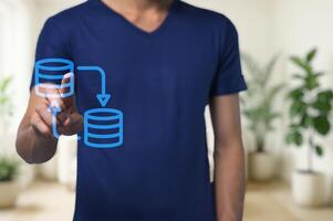 Man Interacting with Data Management Concepts in Modern Workspace photo