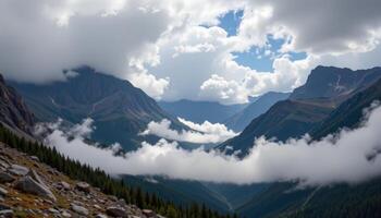 a mountain saddle between two peaks, where winds funnel fiercely and clouds gather quickly in dramatic swirls. photo