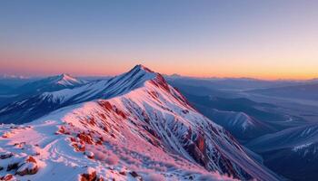 a frosty mountain ridge blanketed in ice, glinting under the first light of dawn. photo