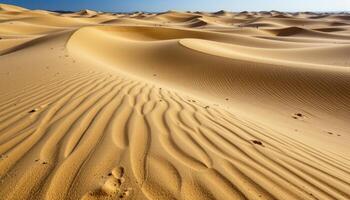 a series of sand dunes that shift shape with every gust of wind, creating ripples and ridges that look carved by invisible hands. photo