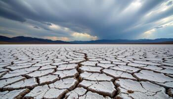 a cracked desert lakebed, dry and patterned like broken porcelain photo