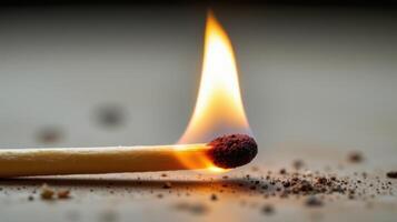 closeup of a burning matchstick photo