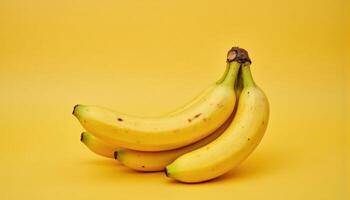 A vibrant yellow banana, perfectly ripened and ready to be enjoyed photo