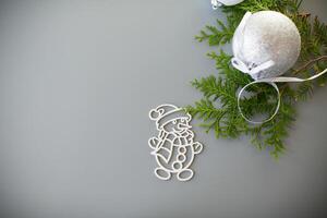 New Year background. Aesthetic winter scene with a Christmas tree toy and space for text photo