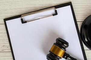 Top view of a blank white paper clipboard with customizable space for text. photo
