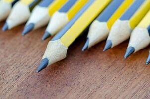 Close up view of pencil standing out representing Leadership with customizable space for text. photo