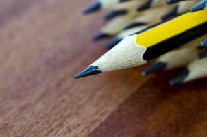 Pencil standing out representing Courage or Leadership with customizable space for text. photo