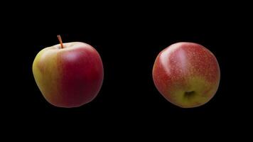 Cyclic rotation of two types of red apples around their axis. Looping motion. Close-up. Alpha Channel. video