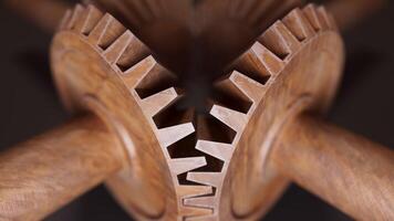 Looping animation of a mechanical construction made of wooden gears. Cyclic movement. Horizontal composition. video