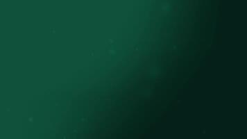 Dark green background with a few white specks ideal for festive designs nature themes or adding a touch of elegance video