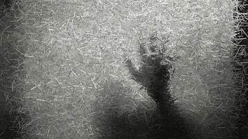 Creepy scene with a hand in the fog outside the window, made of sharp fragments video