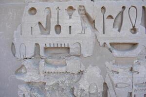 Karnak Temple in Luxor, Egypt. Hieroglyphs and Art on pillars and walls. Temples, pylons, chapels, and other buildings in Karnak, Temple Complex . photo