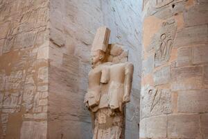 Karnak Temple in Luxor, Egypt. Hieroglyphs and Art on pillars and walls. Temples, pylons, chapels, other buildings in Karnak Temple Complex photo