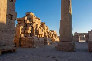 Karnak Temple in Luxor, Egypt. Hieroglyphs and Art on pillars and walls. Temples, pylons chapels, and other buildings in Karnak Temple Complex photo