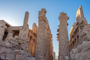 Karnak Temple in Luxor, Egypt. Hieroglyphs and Art on pillars and walls. Temples pylons, chapels and other buildings in Karnak Temple Complex photo