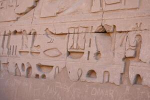 Karnak Temple in Luxor, Egypt. Hieroglyphs and Art on pillars and walls. Temples pylons, chapels, and other buildings in Karnak Temple Complex. photo
