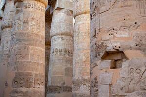 Karnak Temple luxor Egypt Hieroglyphs and Art on pillars and walls Temples, pylons, chapels, and other buildings in Karnak Temple Complex. photo