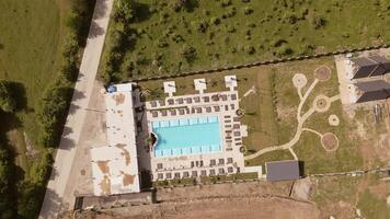 Aerial panorama highway road and Luxury Villa in Kakheti Region. Tranquil Retreat for Travel and Relaxation in the Heart of the Caucasus Mountains.Efficient Space Planning Functional Architecture. video
