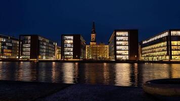 Time lapse clip from the Christians Church in Copenhagen, Denmark behind of modern office building in Copenhagen and with boats passing the canal in front video