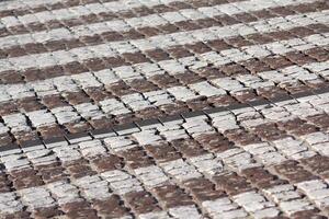 Cobblestone with white stripes of ground transition photo