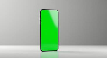 Green screen mockup of a smartphone on a table photo