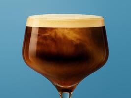 A stemmed glass filled with cold brew coffee, topped with a thick light foam. photo