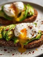 Realistic macro photo in film style of a whole grain toast topped with ripe avocado slices and a perfectly poached egg with a rich runny yolk