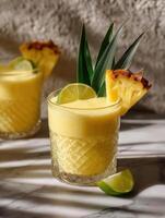 Pineapple smoothie with lime and tropical garnish photo
