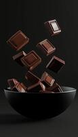 Chocolate bar on black bowl and some floating story vertical background photo
