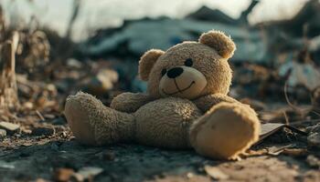 Bear doll dirty on ground soil after disaster land photo