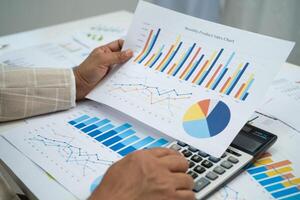 business woman working graph. photo
