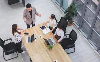 Professional business meeting in office, Teamwork and brainstorming concepts with businesspeople in office meeting photo