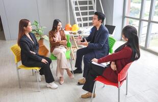 Teamwork and Brainstorming Concept with Businesspeople in Office Meeting, Creative Business Meeting with Team Discussing Ideas in Office Space, Businesspeople Team Discussing Ideas in Modern Office photo